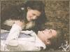 Bella and Edward smiling in the Meadow